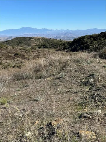 a view of lake with mountain