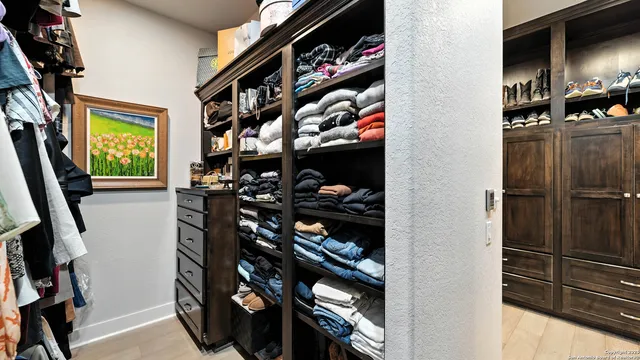 a room with lots of bottles of alcohol