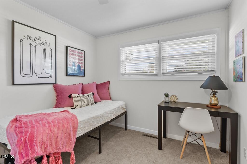 3307 Winston Road Durham, NC 27704 - Photo 11 of 22 a living room with furniture and a large window