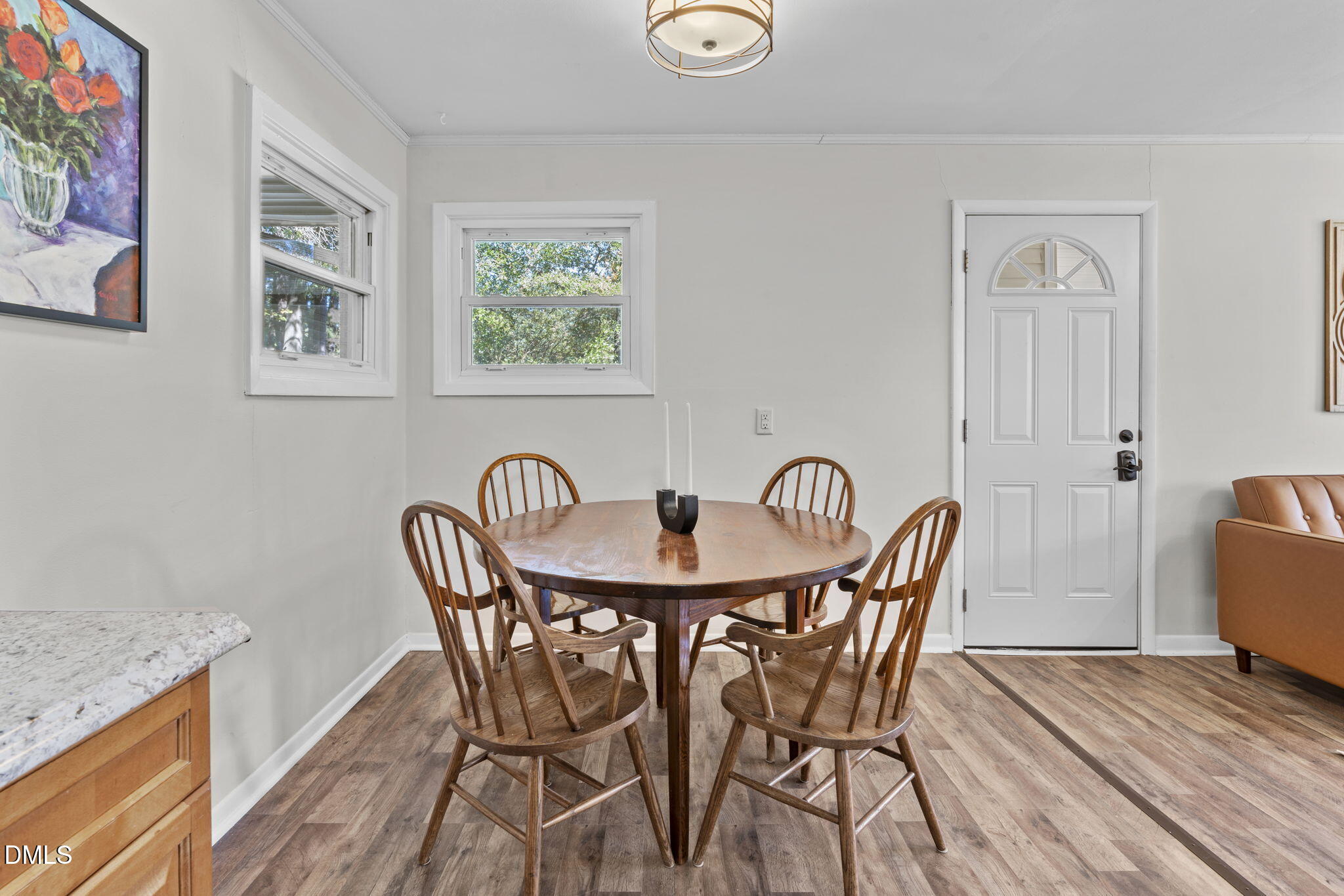 3307 Winston Road Durham, NC 27704 - Photo 18 of 22 a view of a dining room with furniture and wooden floor