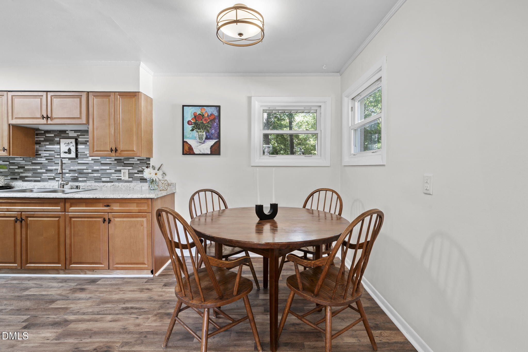3307 Winston Road Durham, NC 27704 - Photo 4 of 22 a table and chairs in a kitchen