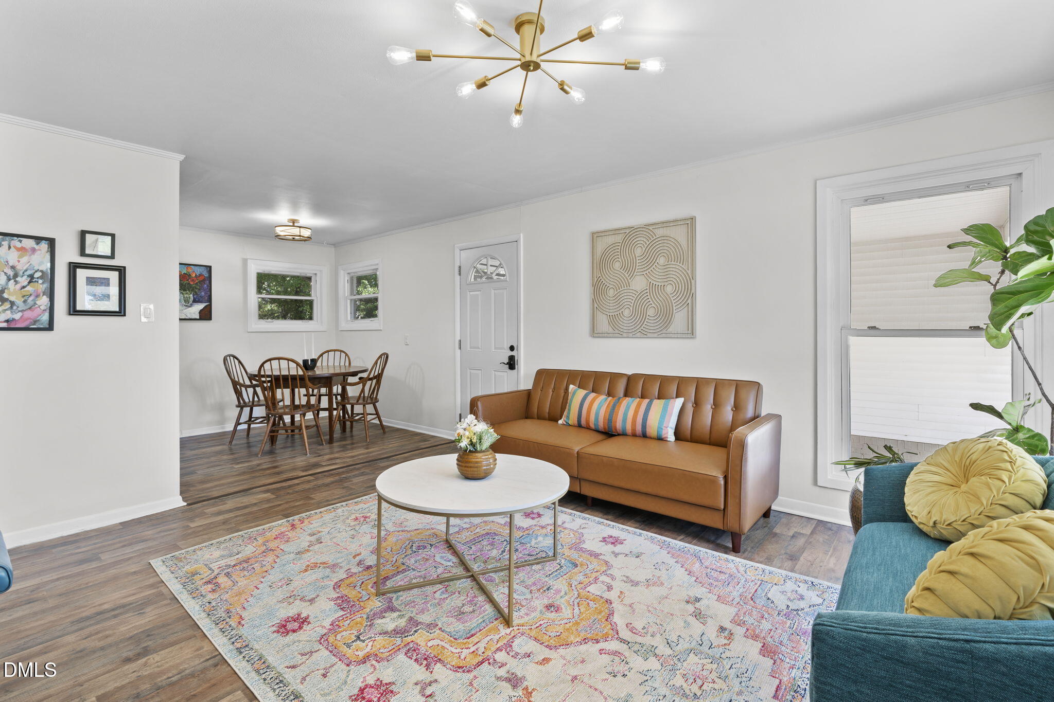 3307 Winston Road Durham, NC 27704 - Photo 8 of 22 a living room with furniture and wooden floor