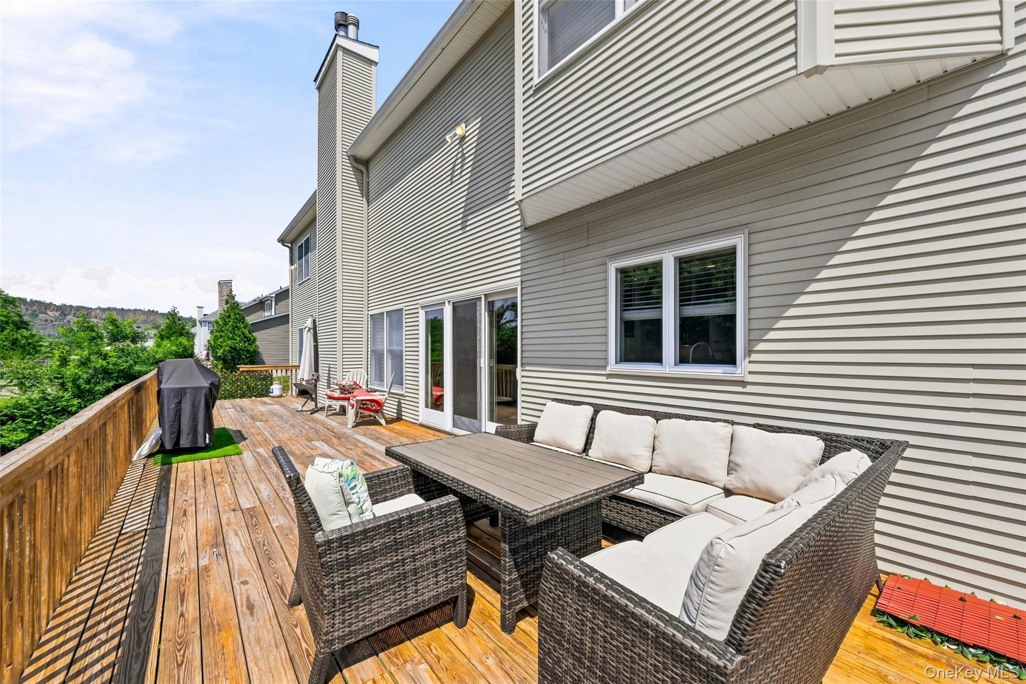 51 Meriwether Trail Congers, NY 10920 - Photo 44 of 50 Expansive wood-finish deck with a wood-plank railing