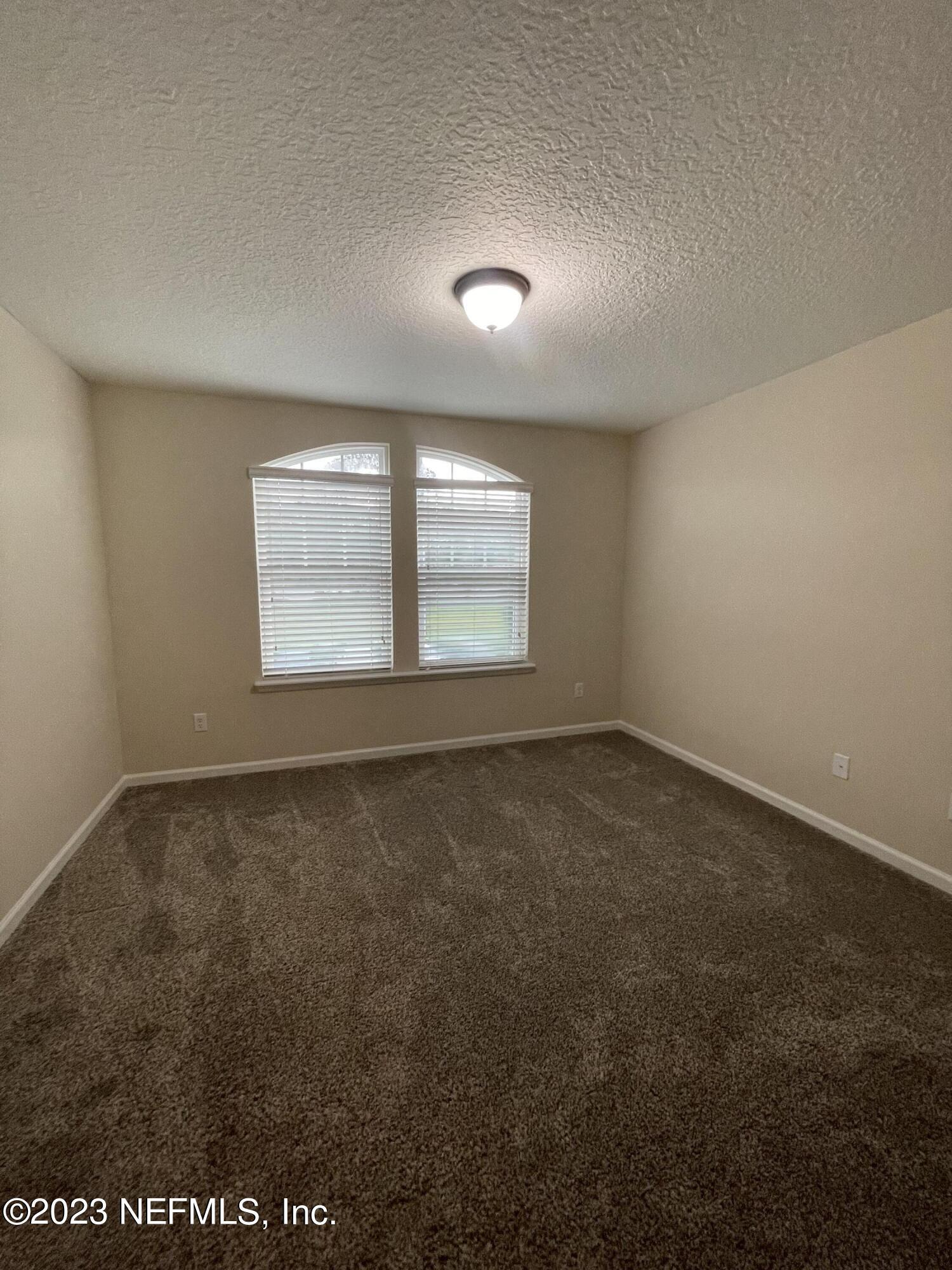 41 Nelson Lane St. Johns, FL 32259 - Photo 5 of 18 an empty room with a window