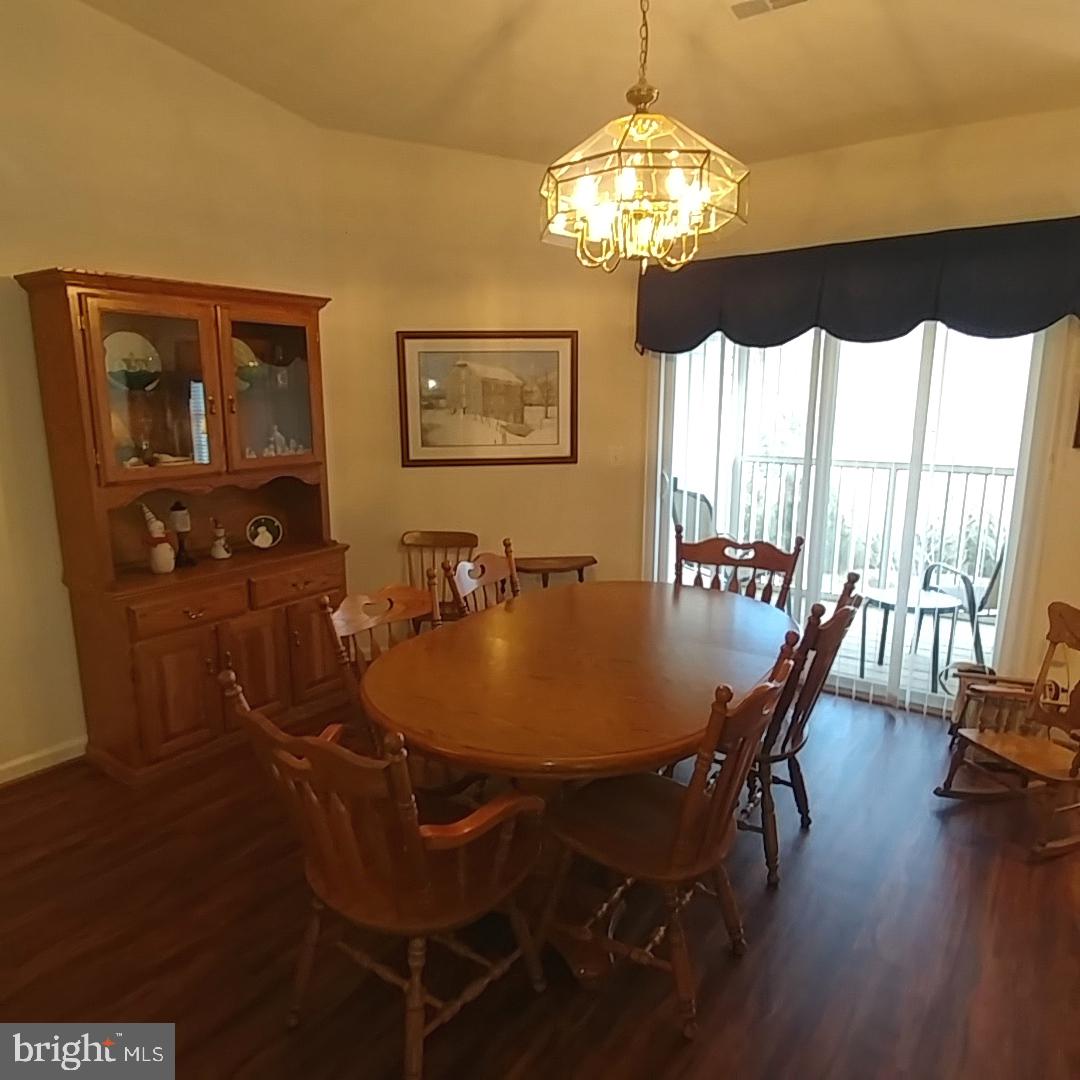 306 Willrich Circle, Unit L Forest Hill, MD 21050 - Photo 11 of 43 Dining Room w/Laminate Floors & Cathedral Ceilings