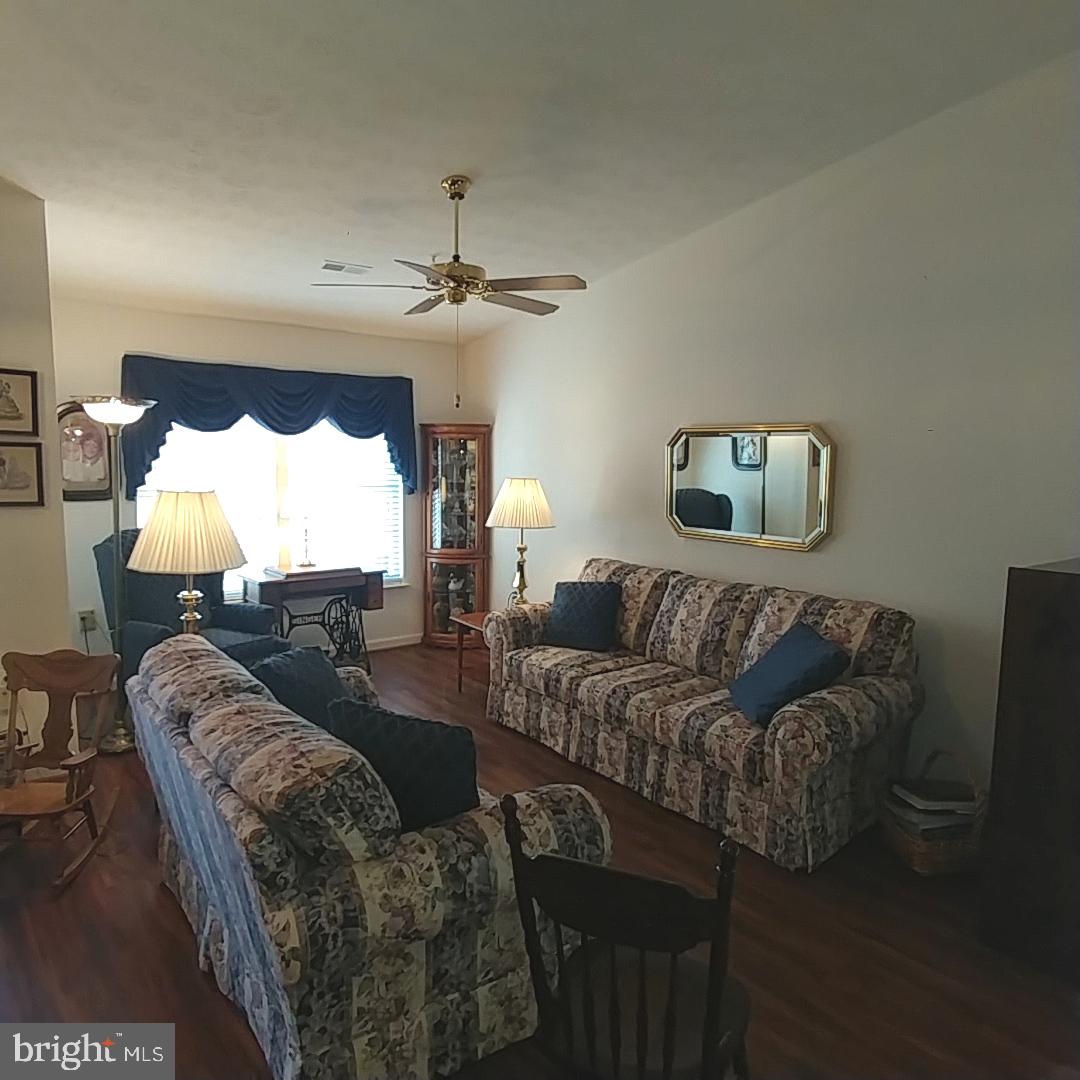 306 Willrich Circle, Unit L Forest Hill, MD 21050 - Photo 12 of 43 Living Room w/Laminate Floors & Cathedral Ceilings