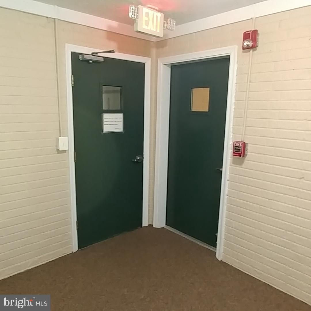 306 Willrich Circle, Unit L Forest Hill, MD 21050 - Photo 34 of 43 Elevator Service to Lower Level Entrance to Garage