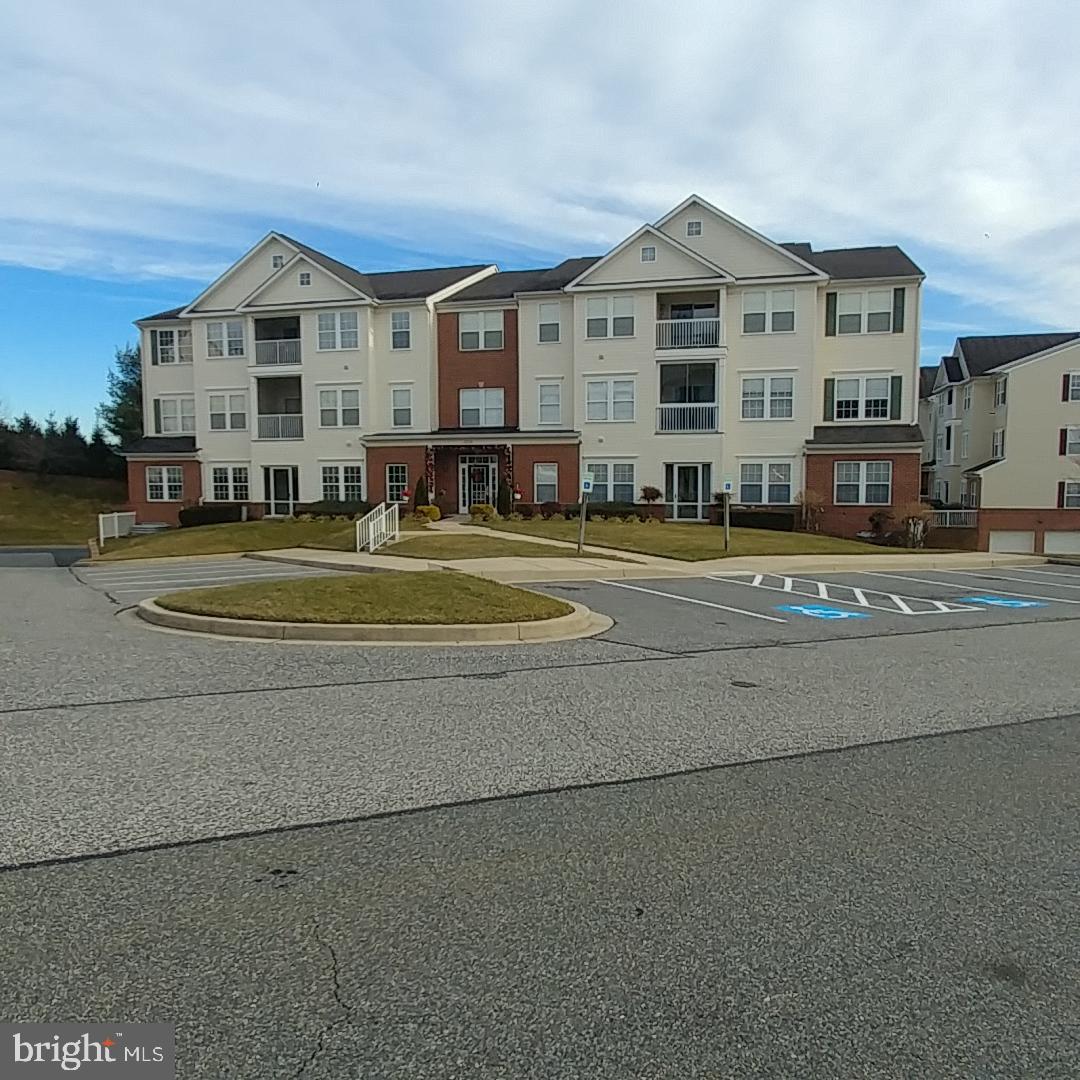 306 Willrich Circle, Unit L Forest Hill, MD 21050 - Photo 38 of 43 Building Front and available parking