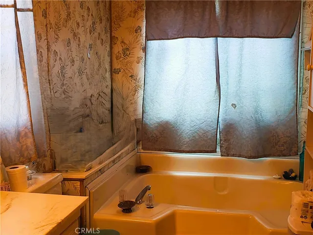 a bathroom with a sink and a tub
