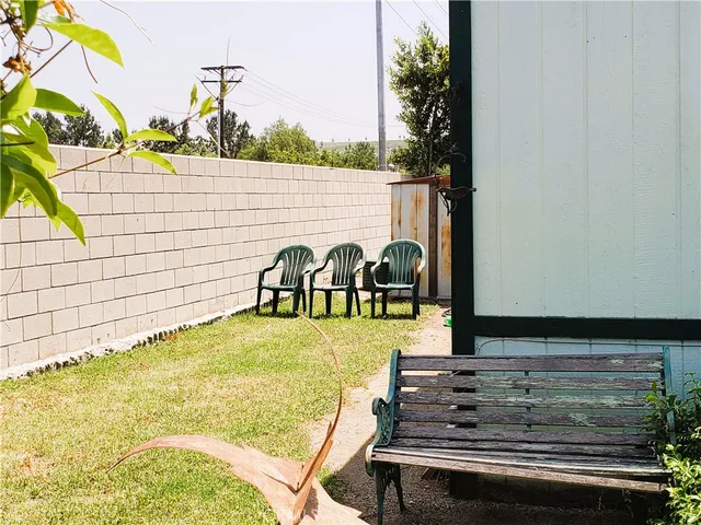 a view of swimming pool with seating area