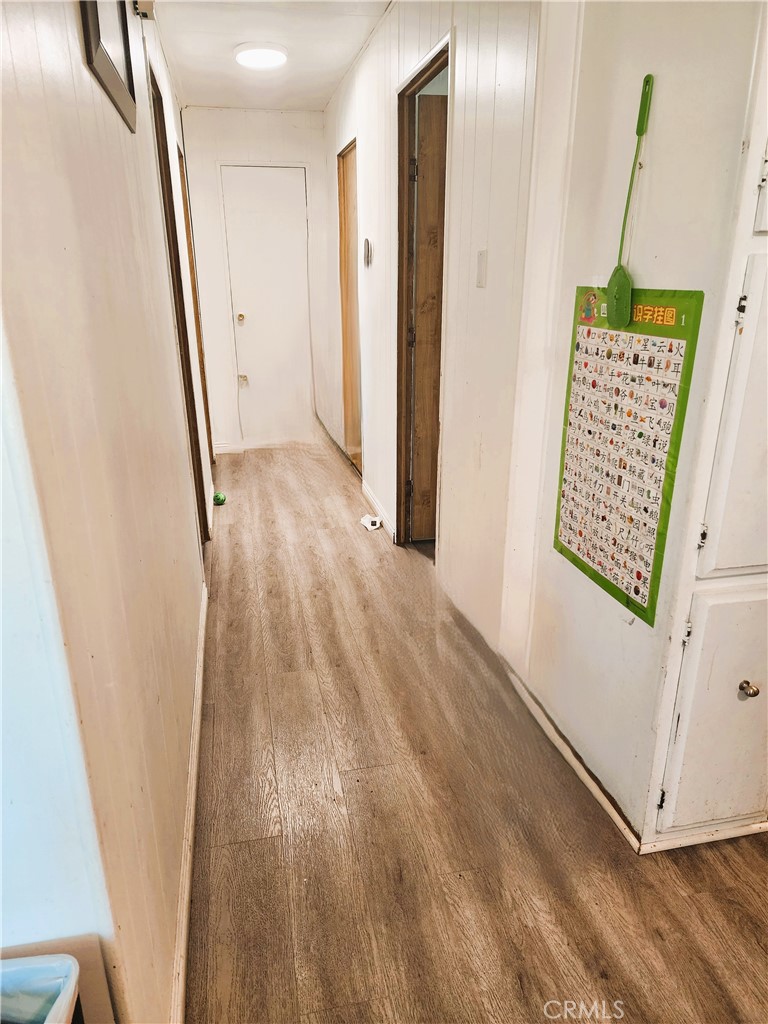 21217 Washington Avenue, Unit 32 Walnut, CA 91789 - Photo 9 of 15 a view of front door with wooden floor