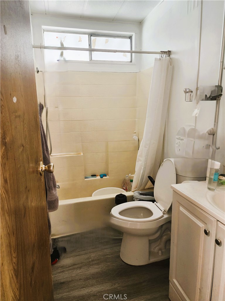 21217 Washington Avenue, Unit 32 Walnut, CA 91789 - Photo 10 of 15 a bathroom with a sink toilet and shower