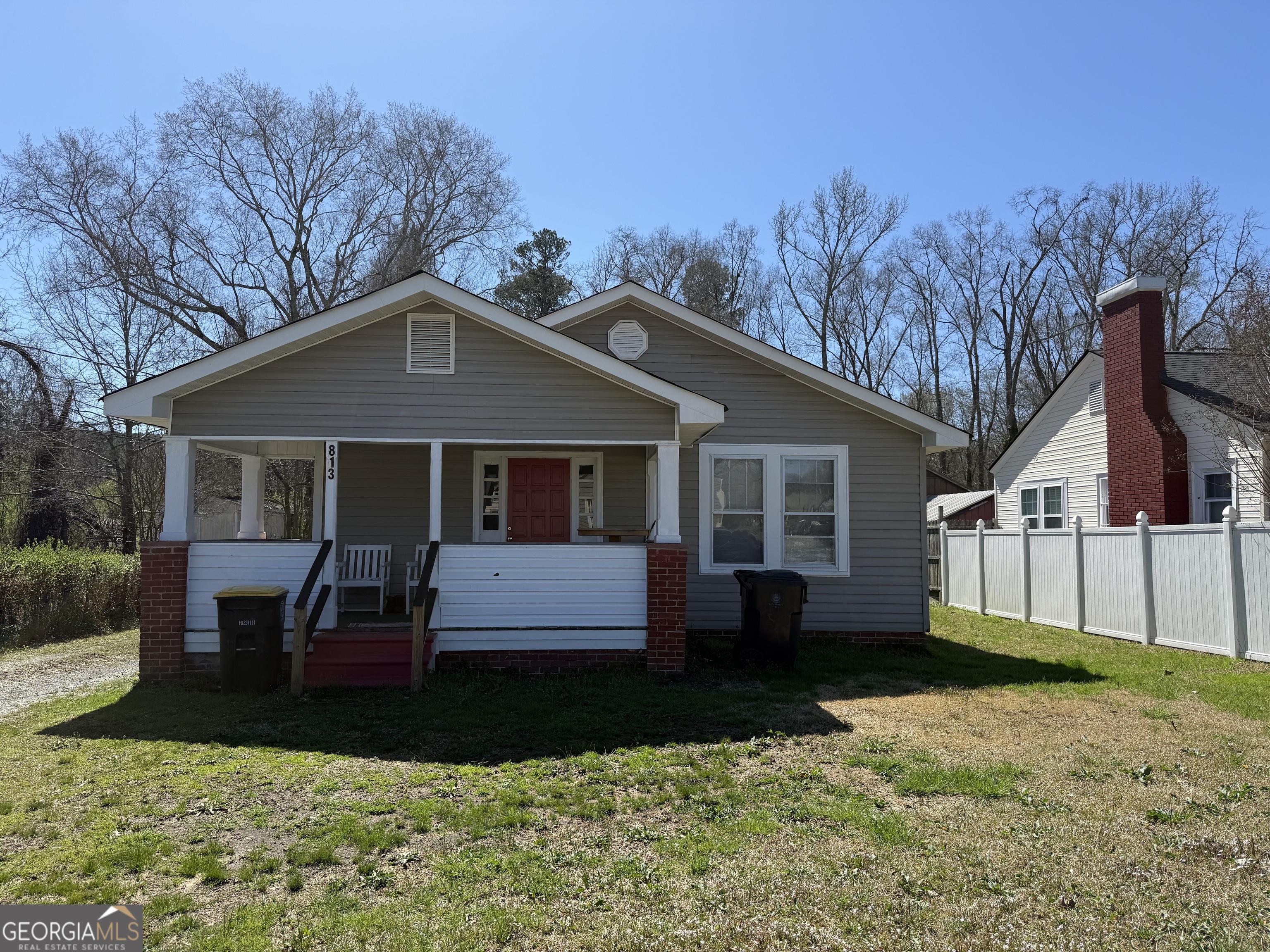 813 Oakland Avenue Southwest Rome, GA 30165 - Photo 1 of 1 a front view of a house with a yard and porch