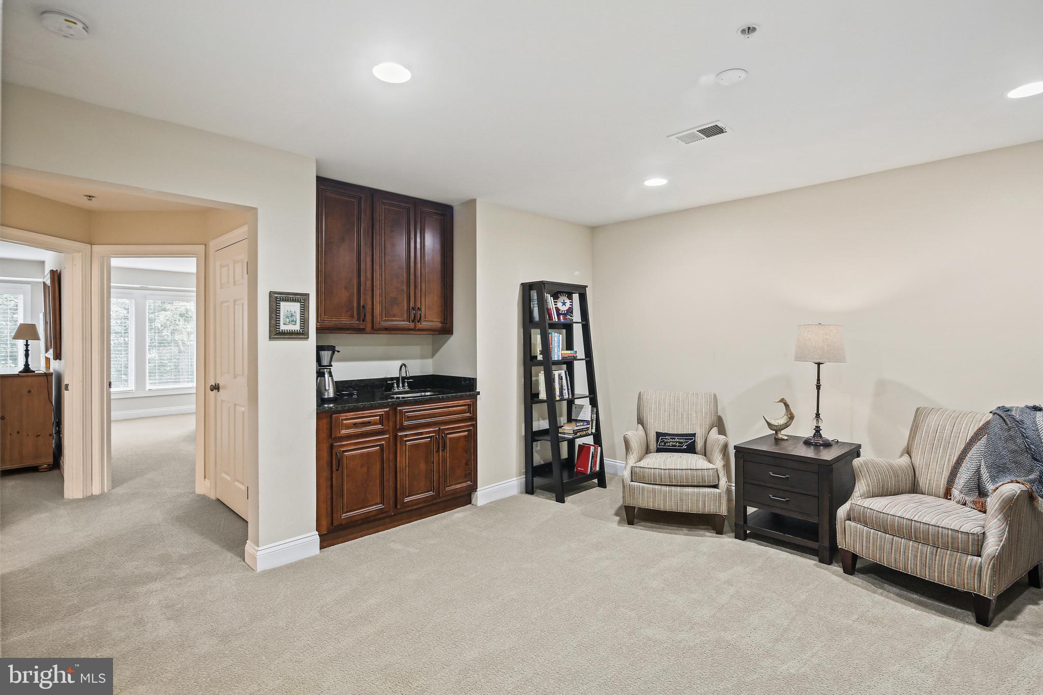 2040 Beacon Heights Drive Reston, VA 20191 - Photo 22 of 38 This level features sitting room with wet bar