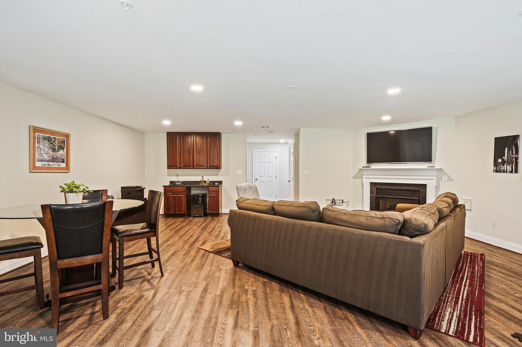 2040 Beacon Heights Drive Reston, VA 20191 - Photo 26 of 38 Fireplace, wetbar and tons of space!