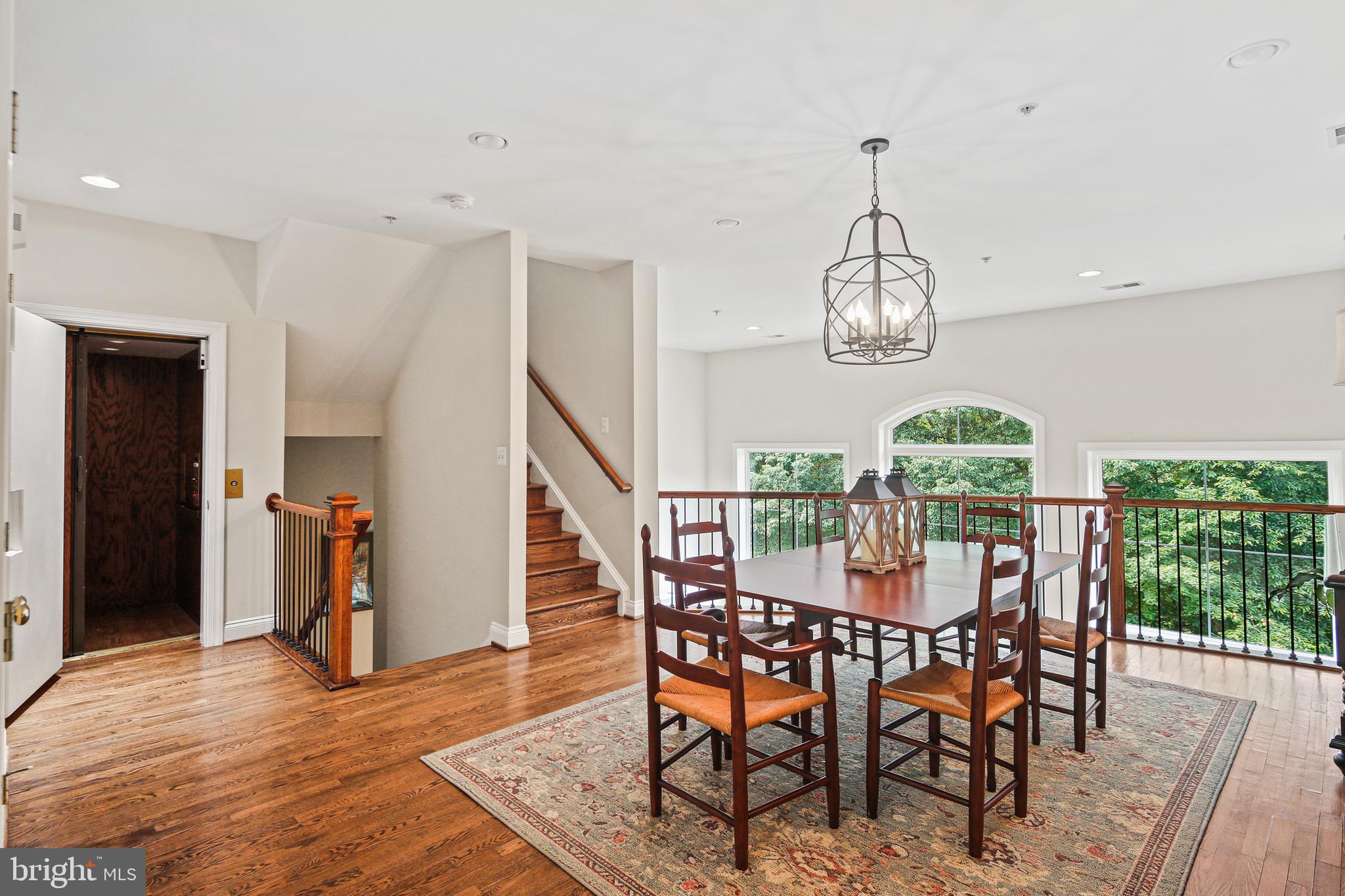 2040 Beacon Heights Drive Reston, VA 20191 - Photo 5 of 38 Elevator is to the left of foyer next to stiars