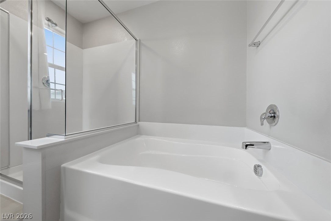 3564 Credere Lane Henderson, NV 89074 - Photo 22 of 40 Bathroom with a garden tub and a shower stall