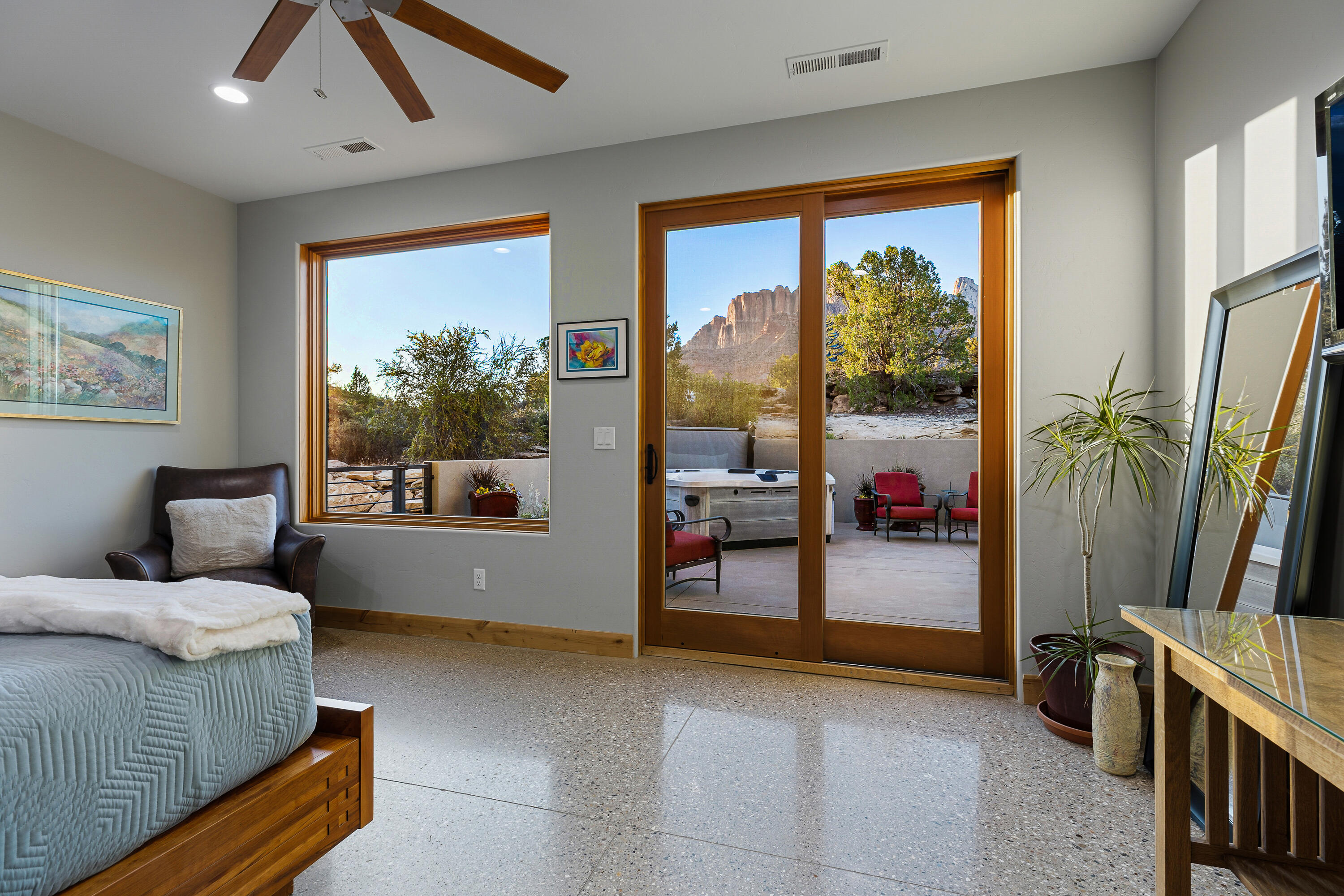 3000 Navajo Way Springdale, UT 84767 - Photo 22 of 63 Primary bedroom with private patio access and views to the red rock landscape.
