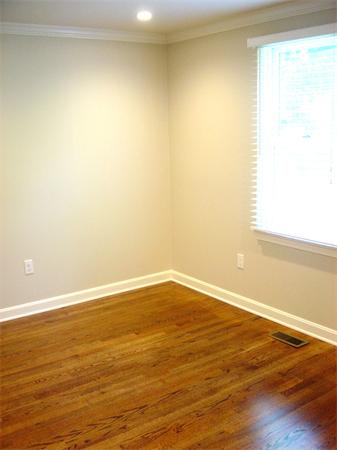 162 Nourse Road Bolton, MA 01740 - Photo 11 of 30 a view of an empty room with wooden floor and a window