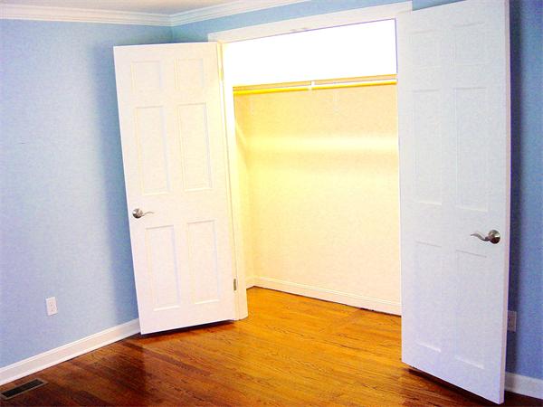 162 Nourse Road Bolton, MA 01740 - Photo 15 of 30 a view of an empty room with wooden floor and a window