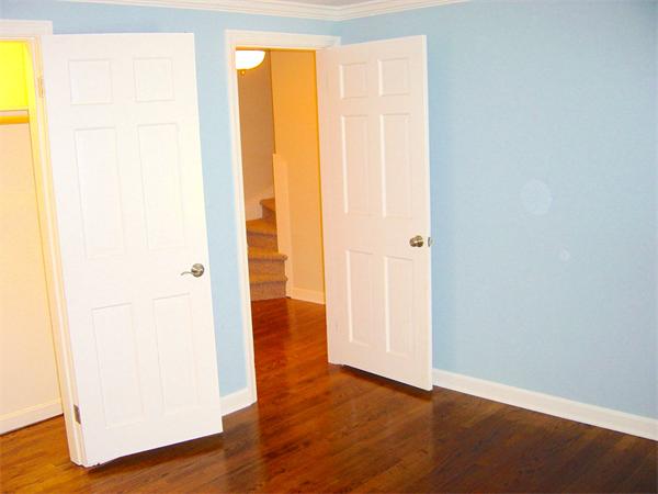162 Nourse Road Bolton, MA 01740 - Photo 16 of 30 an empty room with wooden floor and a window