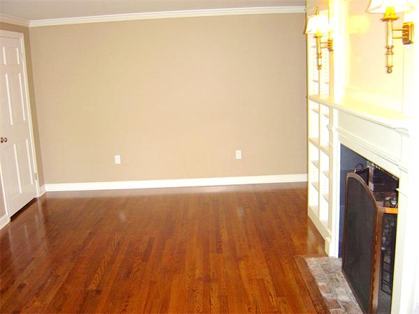 162 Nourse Road Bolton, MA 01740 - Photo 20 of 30 a view of empty room with wooden floor and fan