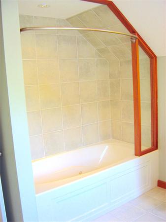 162 Nourse Road Bolton, MA 01740 - Photo 25 of 30 a bathroom with a bathtub and shower