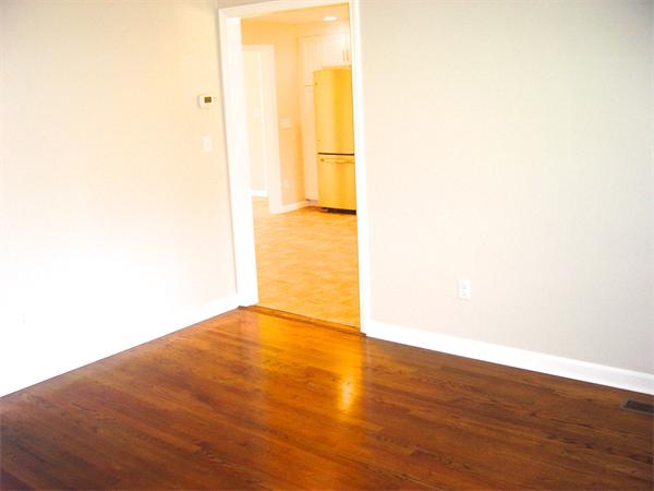 162 Nourse Road Bolton, MA 01740 - Photo 9 of 30 a view of empty room with wooden floor