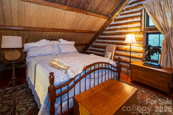 a view of an chairs and table in the balcony
