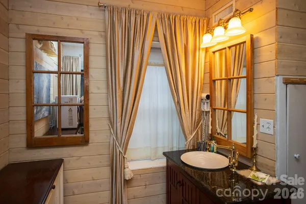 a bathroom with sink and bathtub
