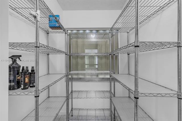 a view of a room with rack on the wall