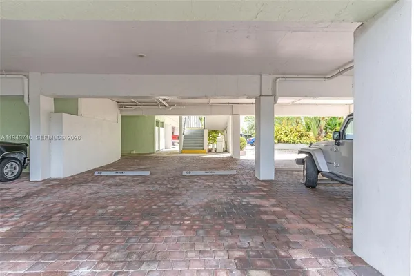 a view of empty room with floor to ceiling window