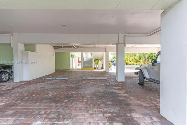 a view of empty room with floor to ceiling window