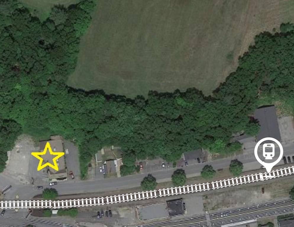 2-4 Ayer Road Shirley, MA 01464 - Photo 2 of 2 a view of a back yard