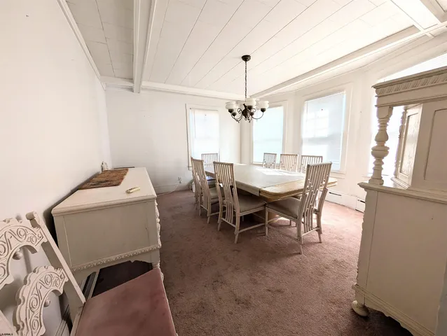 a kitchen that has a sink and a stove