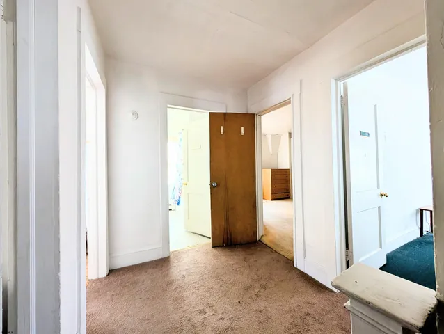 a bathroom with a sink a mirror and a shower