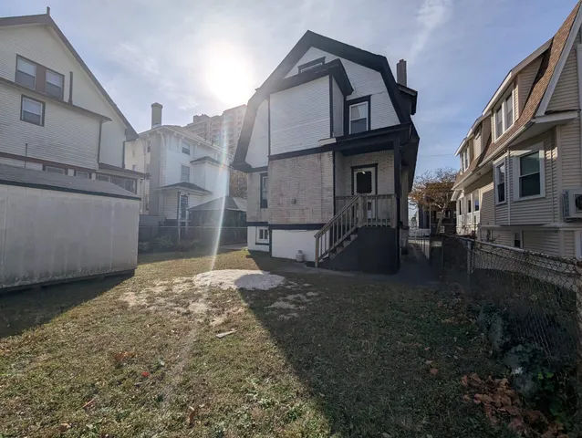 a view of a couches in the back yard of the house