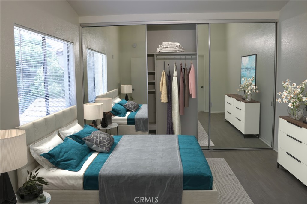 80 Greenmoor, Unit 40 Irvine, CA 92614 - Photo 17 of 26 a living room with furniture and a chandelier