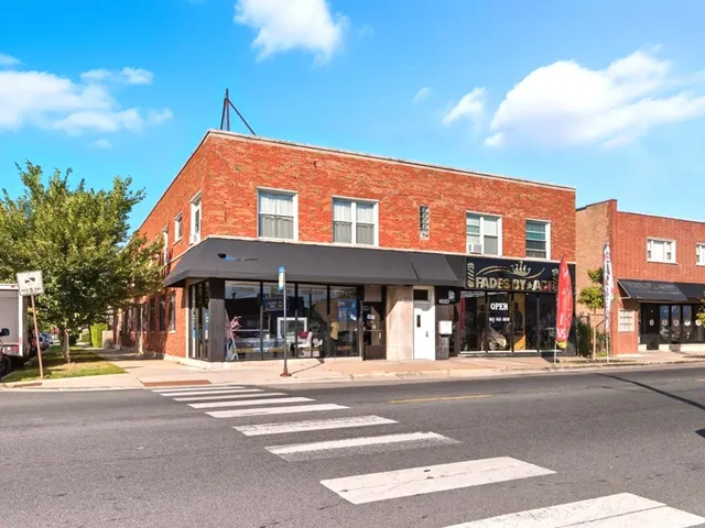 a view of a building and a street