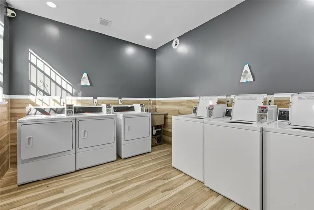 a storage room with washer and dryer