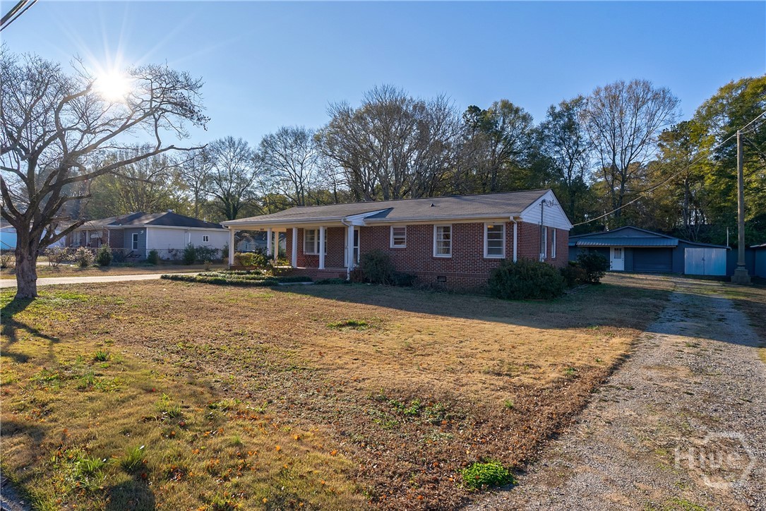 175 Northcrest Drive Athens, GA 30601 - Photo 20 of 34 Driveway to backyard and out-building