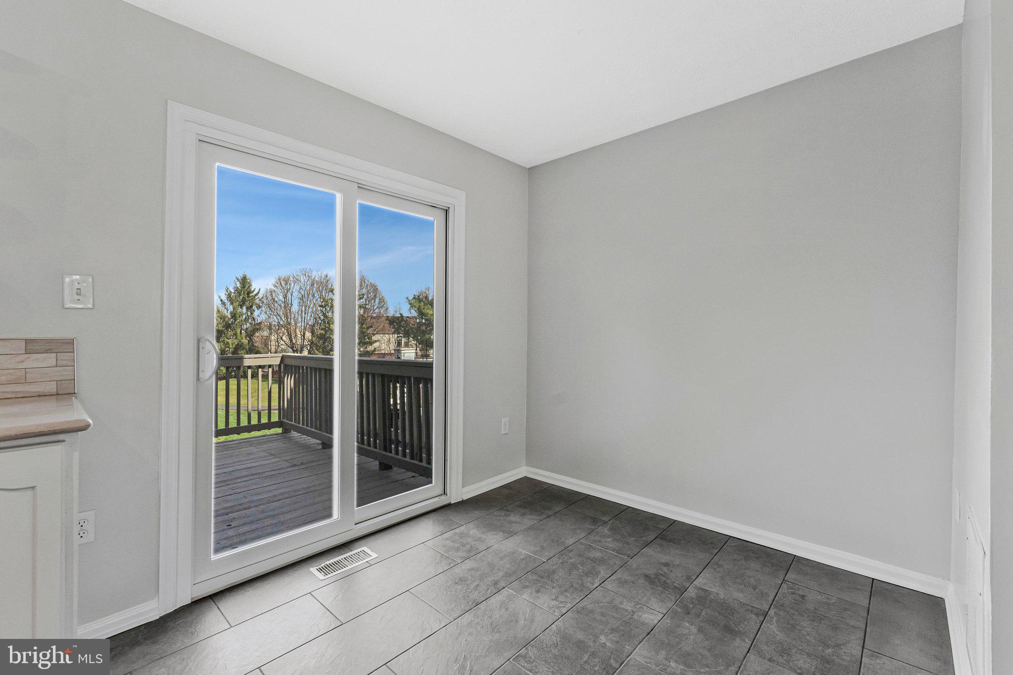 20718 Apollo Terrace Ashburn, VA 20147 - Photo 12 of 50 a view of an entryway with wooden floor