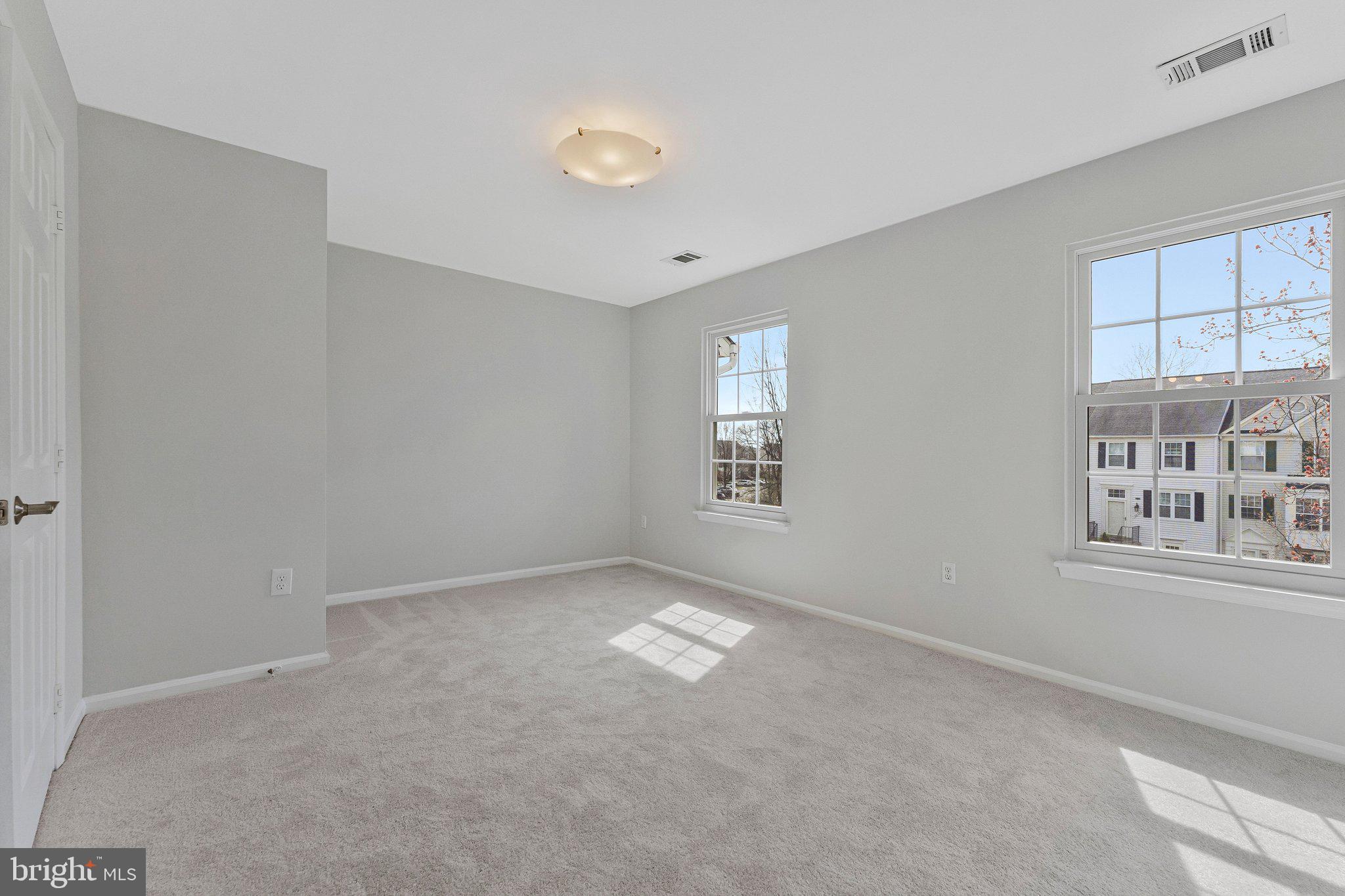 20718 Apollo Terrace Ashburn, VA 20147 - Photo 22 of 50 a view of an empty room with a window