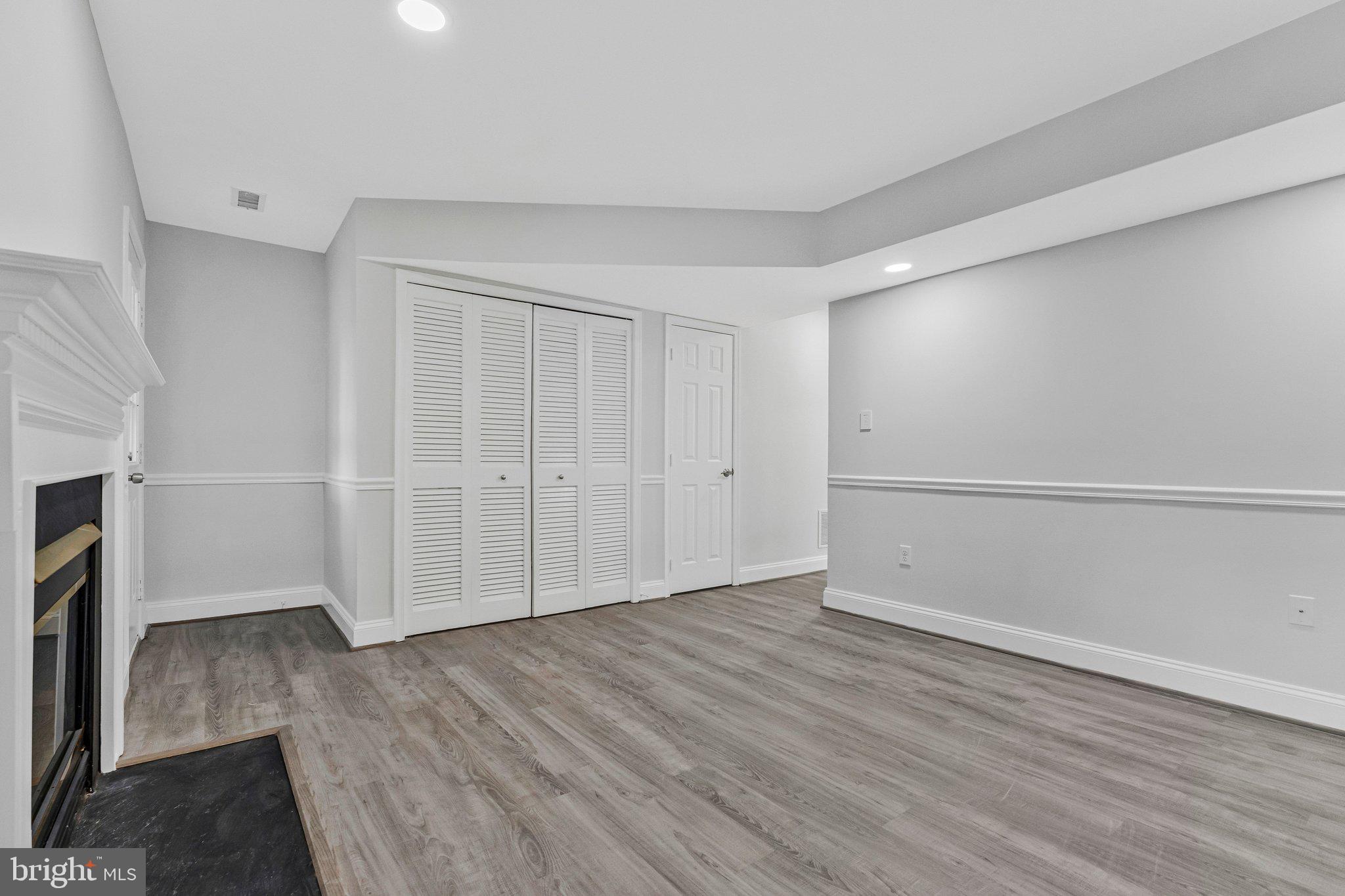 20718 Apollo Terrace Ashburn, VA 20147 - Photo 31 of 50 an empty room with wooden floor