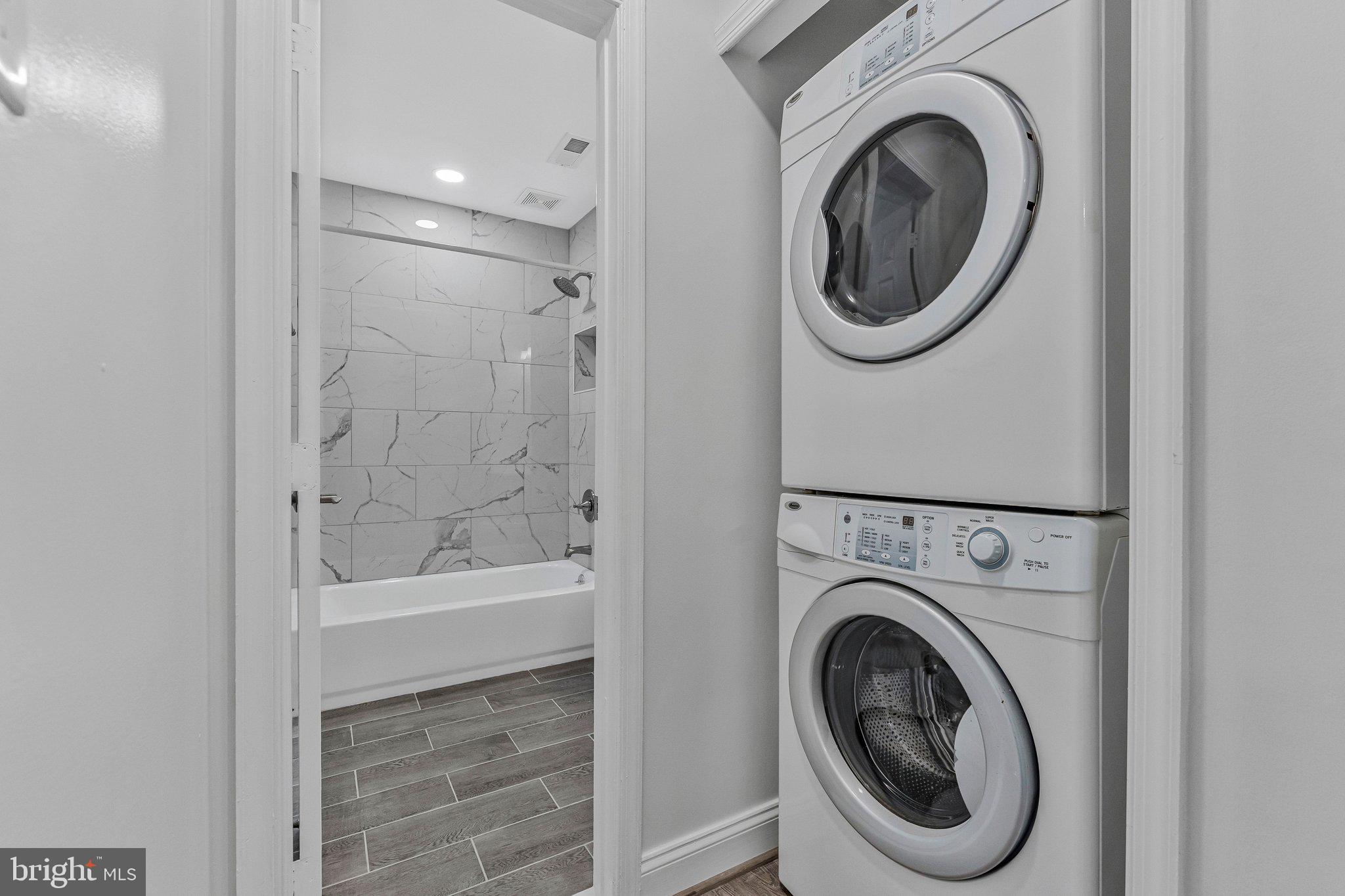 20718 Apollo Terrace Ashburn, VA 20147 - Photo 32 of 50 a bathroom with a sink and a washer