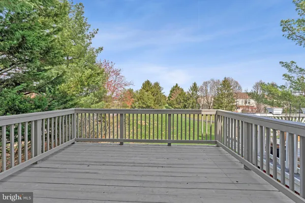 a front view of house with yard outdoor seating and green space