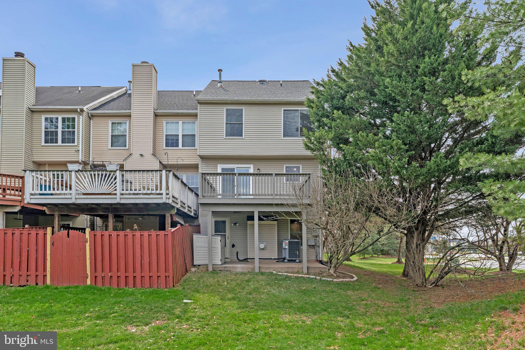 20718 Apollo Terrace Ashburn, VA 20147 - Photo 39 of 50 a front view of house with yard outdoor seating and green space