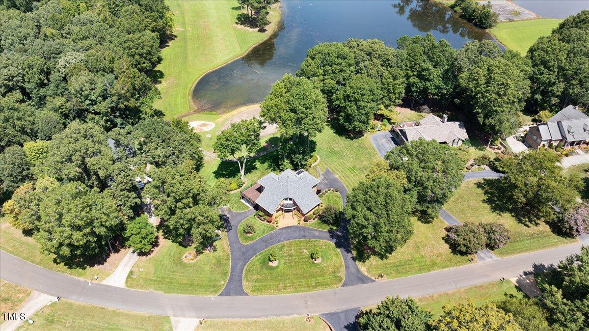312 Lake Winds Trail Rougemont, NC 27572 - Photo 3 of 3 an aerial view of a house with a yard and garden