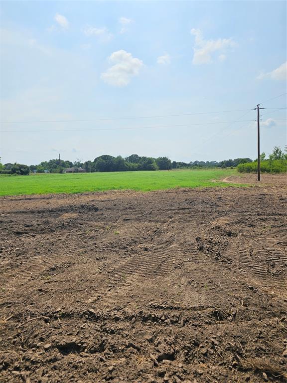 503 Peach Tree Road Mabank, TX 75156 - Photo 1 of 1 a view of a golf course with a lake