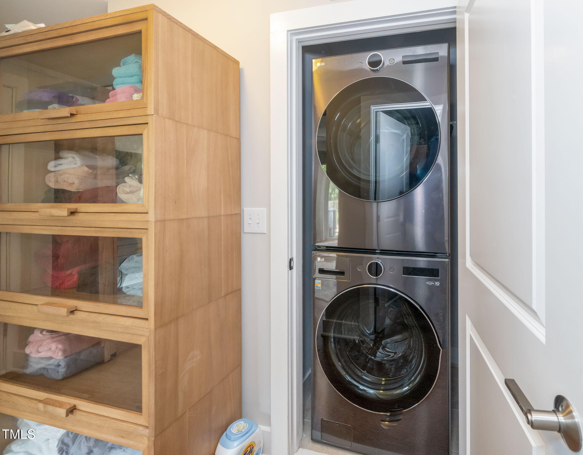 501 North Person Street, Unit 107 Raleigh, NC 27601 - Photo 21 of 30 a close up view of a washer and dryer
